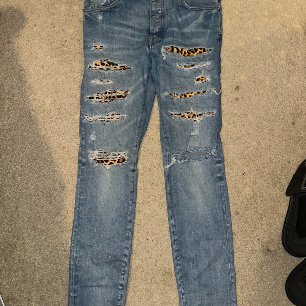 AMIRI Blue Distressed Skinny leopard patch Jeans